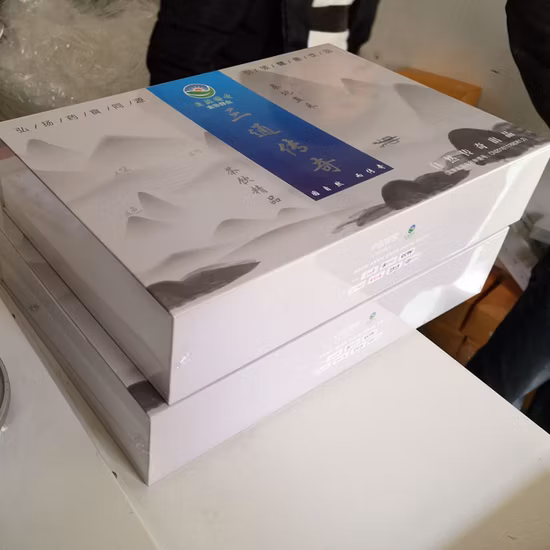 Prix ​​bon marché Prix Remarque Livre Machine d'emballage sous film rétractable Plaquette de frein Livre Film Machine d'emballage sous film rétractable